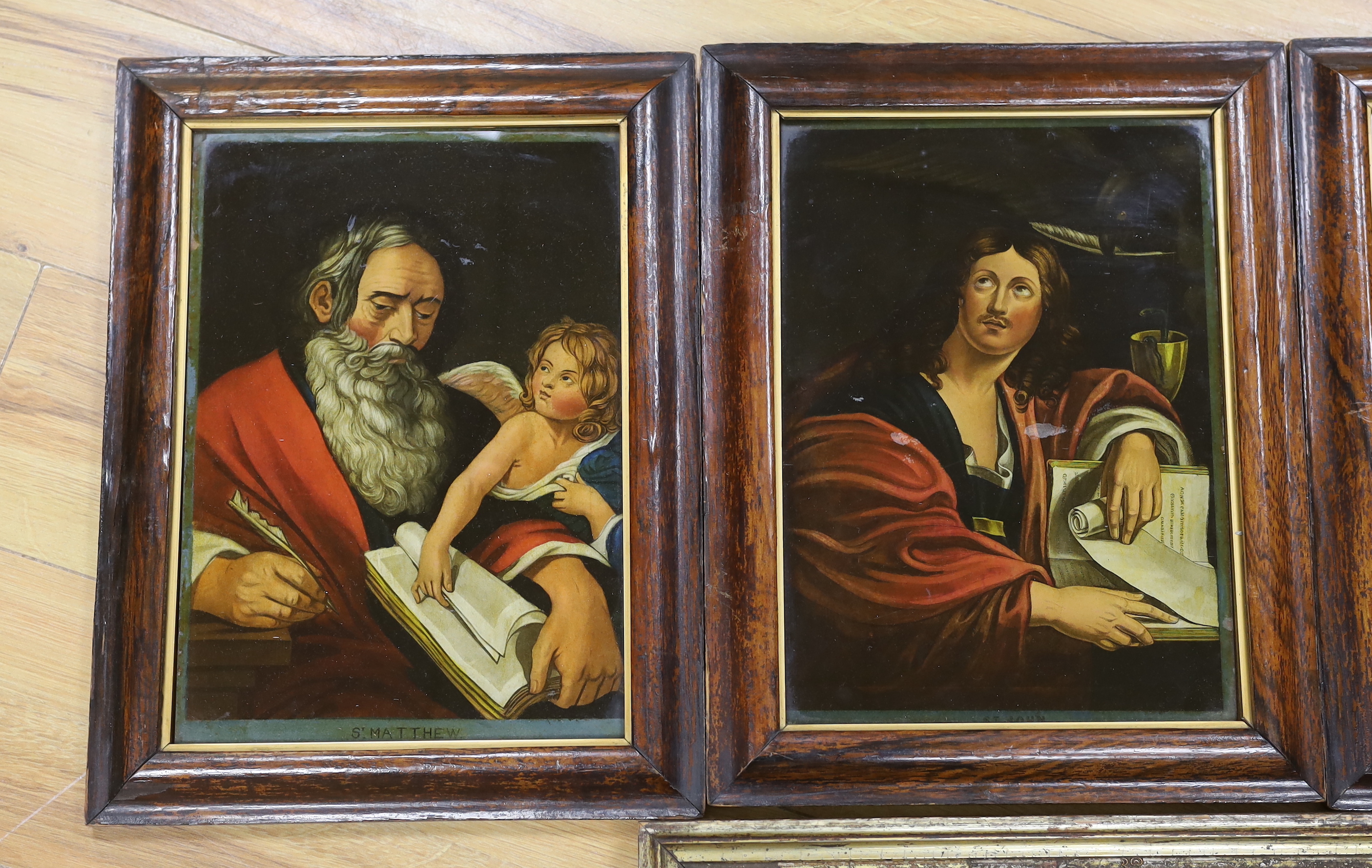 Four late 18th century reverse glass painted prints, including St Matthew, St John, St Mark and one other, 34 x 24cm